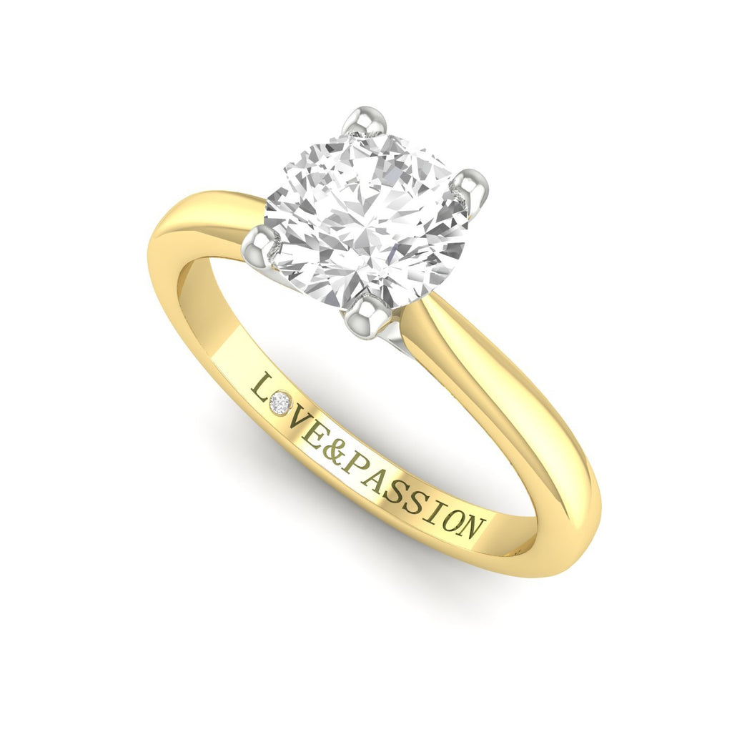 18ct gold classic solitaire diamond ring with a round brilliant cut diamond in a claw setting.