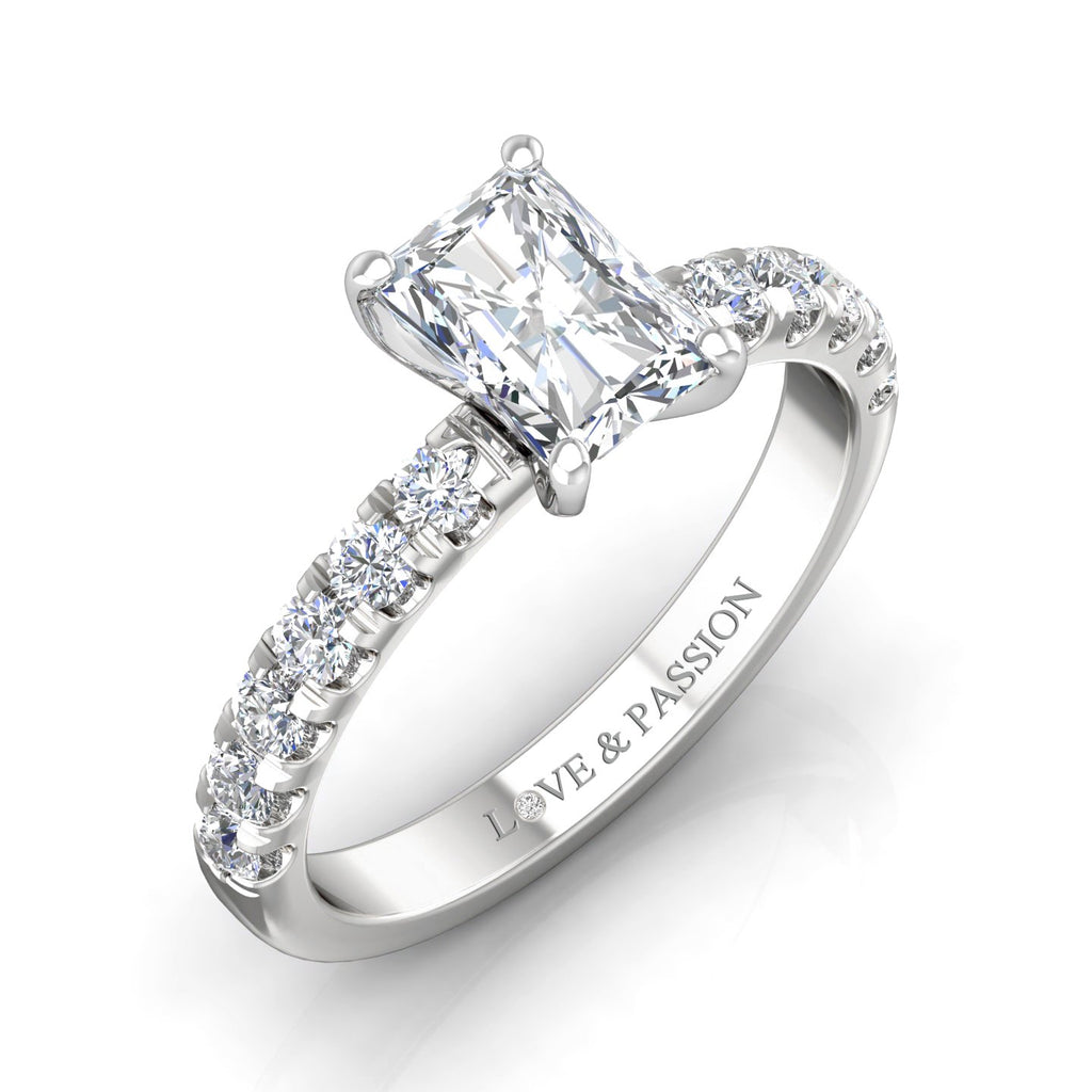 18ct white gold fancy cut Emerald shape diamond ring with pave diamonds. 